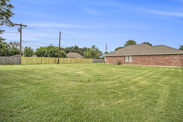 19198 County Road 669e, Alvin, TX 77511 - view of yard with central AC unit