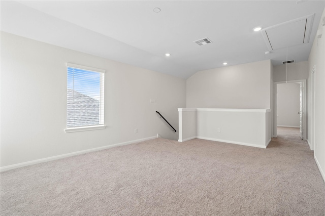 21531 Cypress Trellis Dr, Cypress, TX 77433 - spare room with attic access, light colored carpet, baseboards, recessed lighting, and lofted ceiling