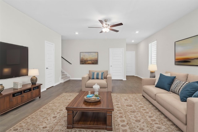 21531 Cypress Trellis Dr, Cypress, TX 77433 - living area featuring stairs, a ceiling fan, wood finished floors, baseboards, and recessed lighting