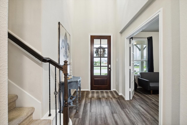 17218 Roxburgh Lake Ln, Hockley, TX 77447 - entrance foyer with wood finished floors, stairway, and baseboards