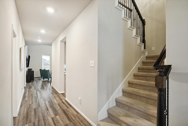 17218 Roxburgh Lake Ln, Hockley, TX 77447 - stairs featuring wood finished floors, baseboards, and recessed lighting