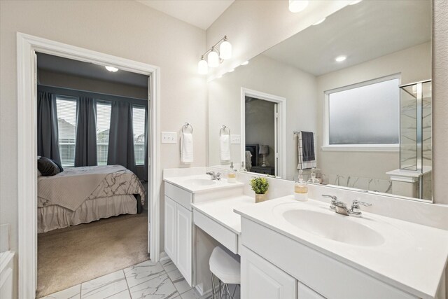 17218 Roxburgh Lake Ln, Hockley, TX 77447 - full bathroom featuring connected bathroom, double vanity, and marble look tiles