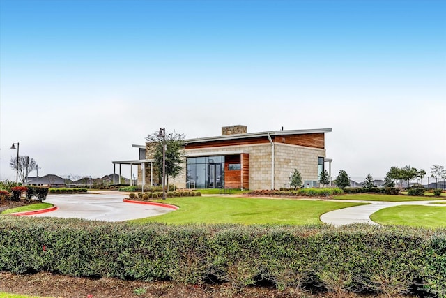 17218 Roxburgh Lake Ln, Hockley, TX 77447 - view of front of property featuring a chimney and a front yard