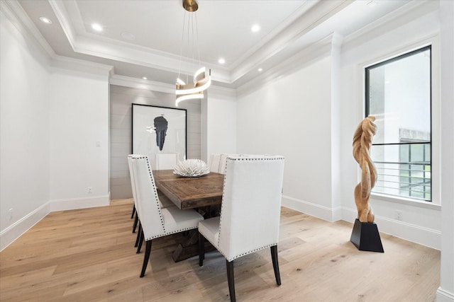 5202 Carew St, Houston, TX 77096 - dining area with crown molding, light wood-type flooring, a tray ceiling, baseboards, and recessed lighting