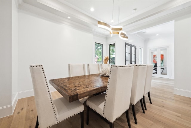 5202 Carew St, Houston, TX 77096 - dining room featuring light wood-style floors, crown molding, recessed lighting, and baseboards