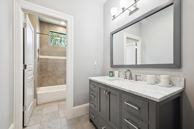 5202 Carew St, Houston, TX 77096 - full bath featuring baseboards, vanity, and bathtub / shower combination