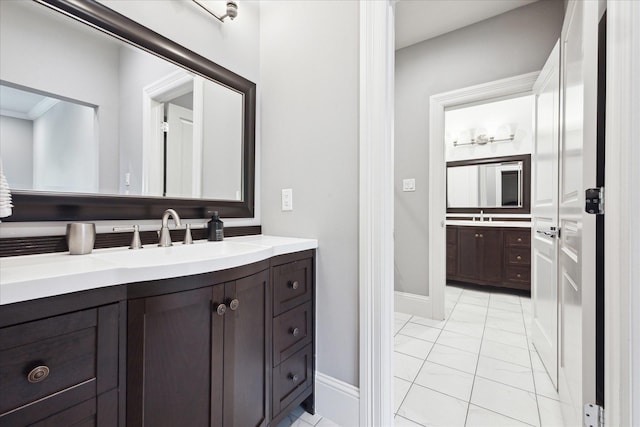 5202 Carew St, Houston, TX 77096 - bathroom with vanity and baseboards