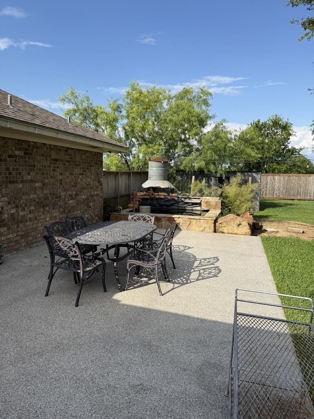 563 12th St, Bay City, TX 77414 - view of patio featuring outdoor dining space