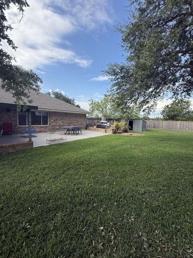 563 12th St, Bay City, TX 77414 - view of yard with a patio area