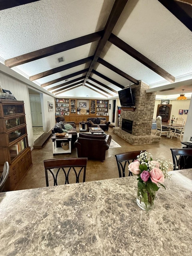 563 12th St, Bay City, TX 77414 - living area with a textured ceiling and a brick fireplace