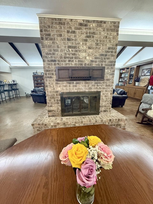 563 12th St, Bay City, TX 77414 - living area with a brick fireplace and vaulted ceiling