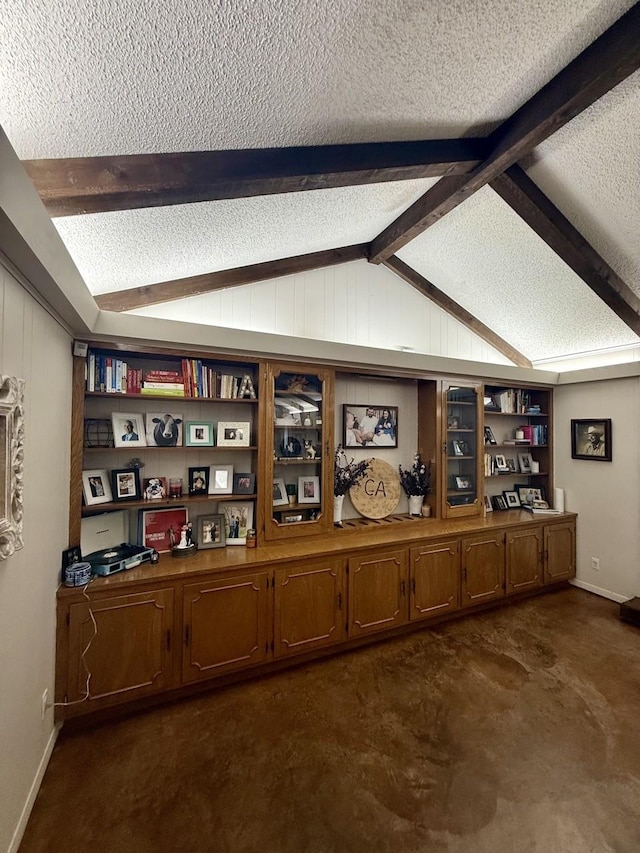 563 12th St, Bay City, TX 77414 - detailed view of a textured ceiling, beamed ceiling, and baseboards