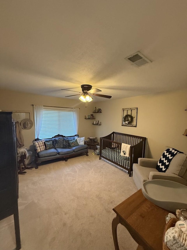 563 12th St, Bay City, TX 77414 - living area with carpet flooring and ceiling fan