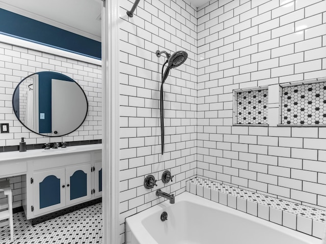 563 12th St, Bay City, TX 77414 - full bathroom with bathtub / shower combination, tile walls, vanity, and ornamental molding
