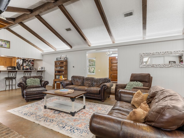 563 12th St, Bay City, TX 77414 - living room featuring a chandelier and wooden walls
