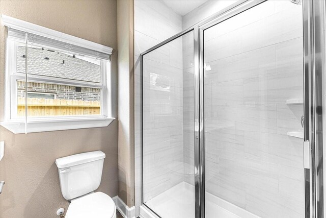 6514 Arabella, Houston, TX 77091 - bathroom featuring toilet and a shower stall