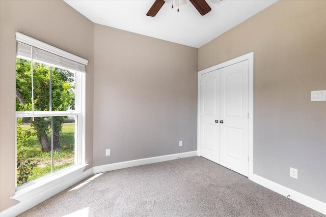 6514 Arabella, Houston, TX 77091 - unfurnished bedroom featuring carpet flooring, baseboards, a closet, and a ceiling fan