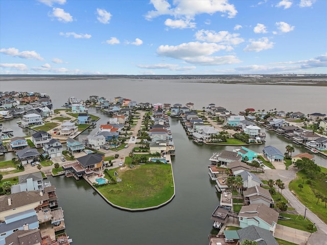 502 Westerly Dr, Tiki Island, TX 77554 - aerial perspective of suburban area with a nearby body of water