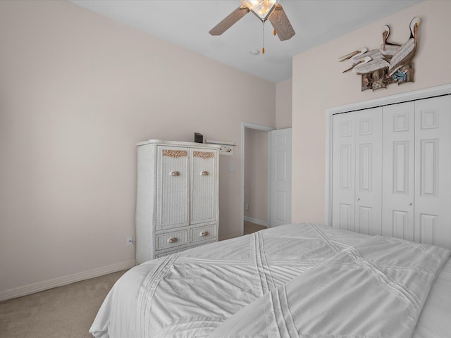 502 Westerly Dr, Tiki Island, TX 77554 - bedroom with carpet flooring, a closet, a ceiling fan, and baseboards
