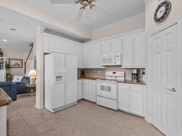 502 Westerly Dr, Tiki Island, TX 77554 - kitchen featuring white appliances, open floor plan, white cabinetry, decorative backsplash, and a ceiling fan