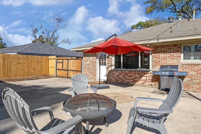 2207 Latexo Dr, Houston, TX 77018 - view of patio / terrace featuring an outdoor fire pit, a gate, and grilling area