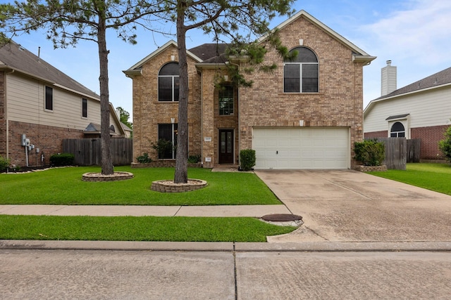 2615 Crystal Falls Dr, Pearland, TX 77584 - traditional home with brick siding, a garage, and driveway