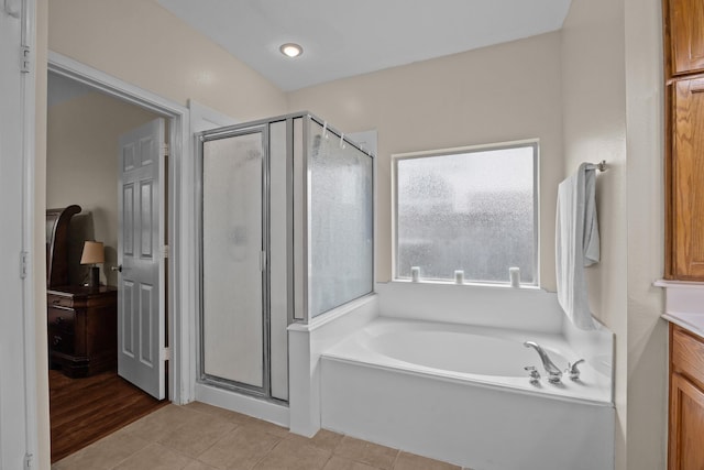 2615 Crystal Falls Dr, Pearland, TX 77584 - bathroom featuring a shower stall, a garden tub, vanity, and tile patterned flooring