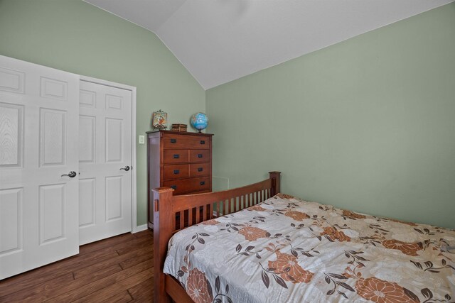 2615 Crystal Falls Dr, Pearland, TX 77584 - bedroom with hardwood / wood-style flooring and lofted ceiling