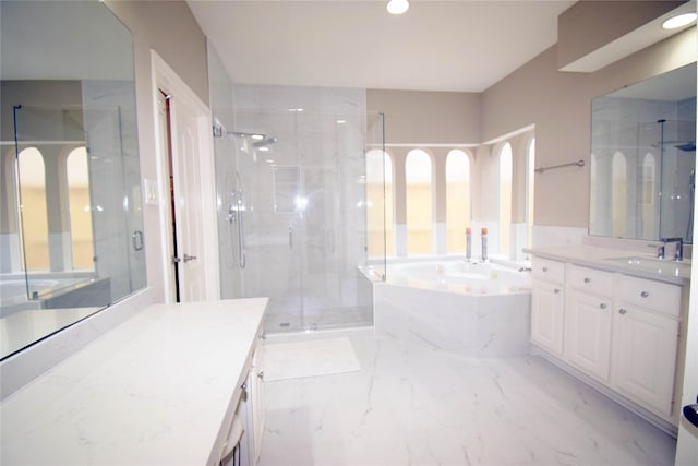 5810 Brook Bend Dr, Sugar Land, TX 77479 - full bath with a bath, vanity, a marble finish shower, marble finish floors, and recessed lighting