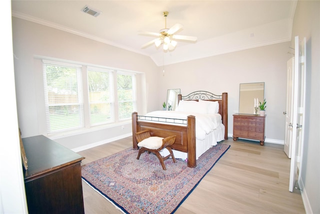 5810 Brook Bend Dr, Sugar Land, TX 77479 - bedroom with ornamental molding, light wood-style floors, a ceiling fan, and lofted ceiling