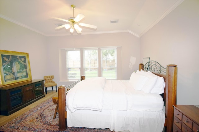 5810 Brook Bend Dr, Sugar Land, TX 77479 - bedroom with crown molding, light wood-style floors, vaulted ceiling, and a ceiling fan