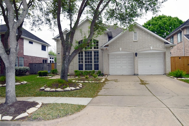 5810 Brook Bend Dr, Sugar Land, TX 77479 - view of front facade with brick siding, an attached garage, and driveway