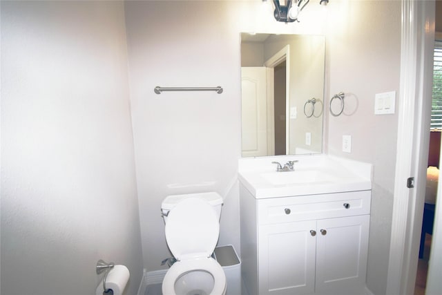5810 Brook Bend Dr, Sugar Land, TX 77479 - bathroom featuring vanity and toilet