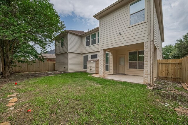2938 Intrepid Elm St, Houston, TX 77084 - back of property featuring a patio