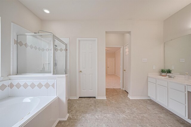 2938 Intrepid Elm St, Houston, TX 77084 - full bathroom featuring vanity, a shower stall, a bath, and tile patterned floors