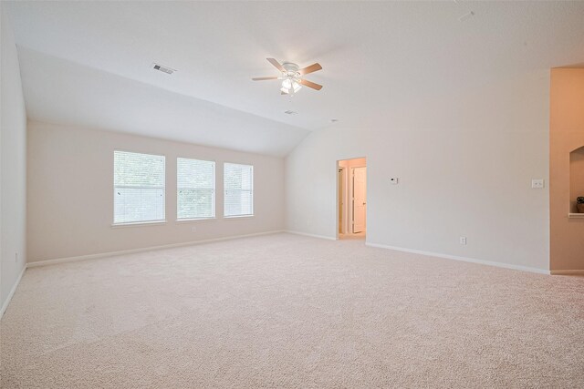 2938 Intrepid Elm St, Houston, TX 77084 - empty room with a ceiling fan, lofted ceiling, light colored carpet, and baseboards