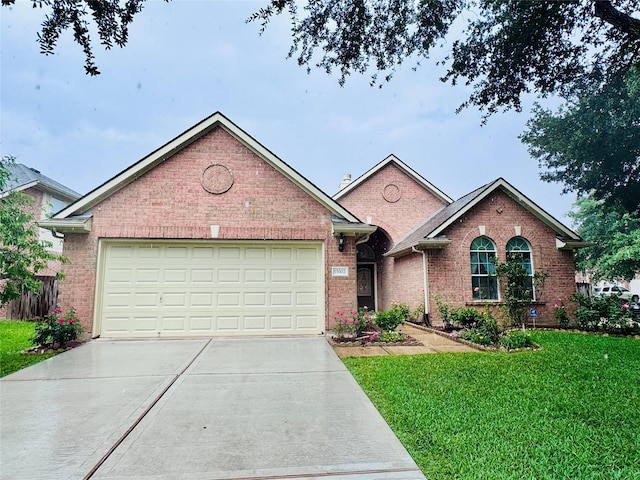 15102 Millers Run Ln, Sugar Land, TX 77498 - single story home featuring brick siding, a front lawn, concrete driveway, and a garage