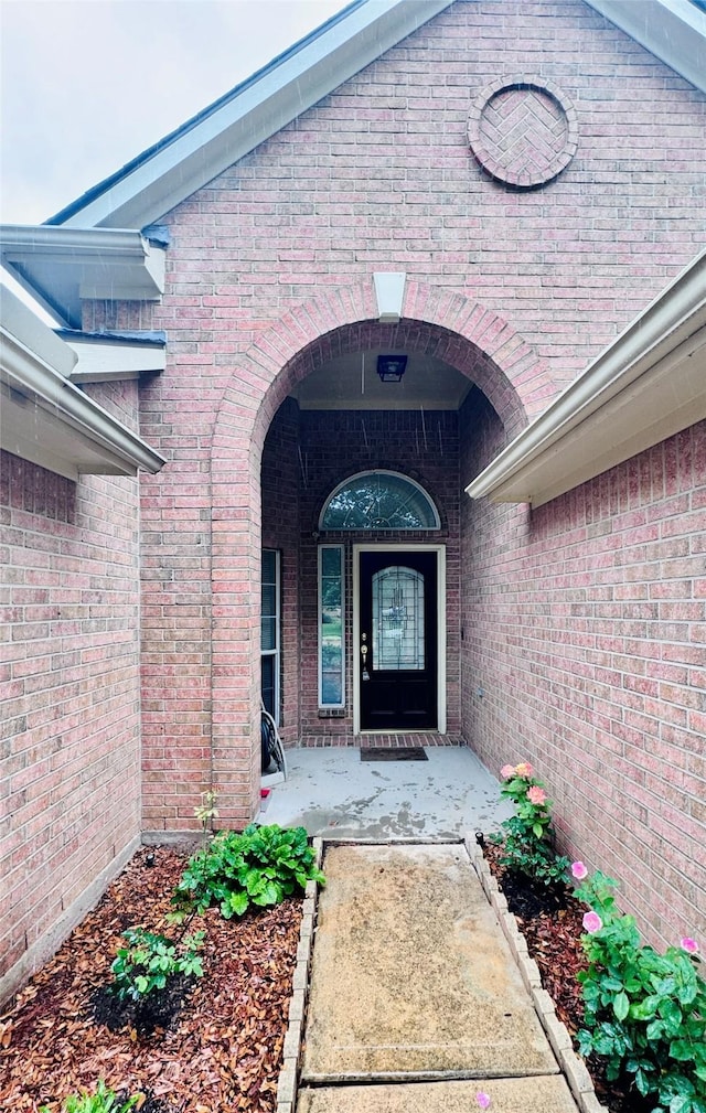 15102 Millers Run Ln, Sugar Land, TX 77498 - view of exterior entry featuring brick siding