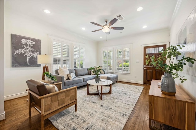 2621 Morrison St, Houston, TX 77009 - living room featuring plenty of natural light, baseboards, wood finished floors, crown molding, and recessed lighting