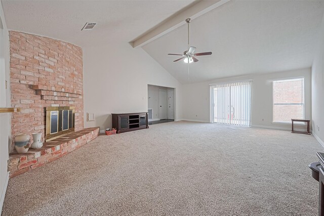 13207 Robinglen Dr, Houston, TX 77083 - unfurnished living room featuring a fireplace, carpet flooring, a ceiling fan, beamed ceiling, and baseboards