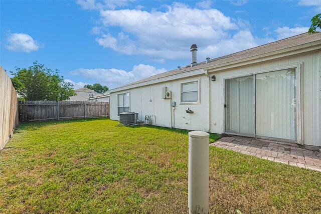 13207 Robinglen Dr, Houston, TX 77083 - back of property with central AC