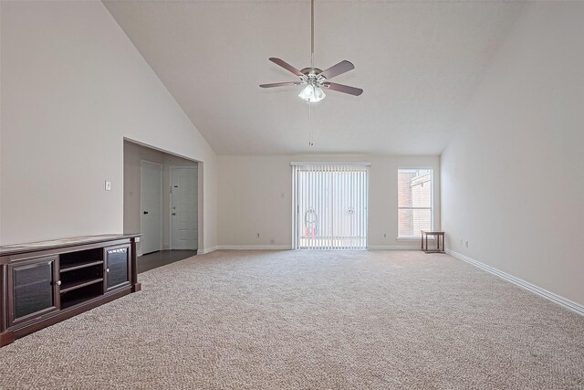 13207 Robinglen Dr, Houston, TX 77083 - unfurnished living room featuring carpet flooring, high vaulted ceiling, a ceiling fan, and baseboards