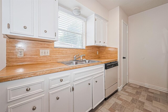 13207 Robinglen Dr, Houston, TX 77083 - kitchen featuring dishwasher, a sink, white cabinetry, decorative backsplash, and light countertops