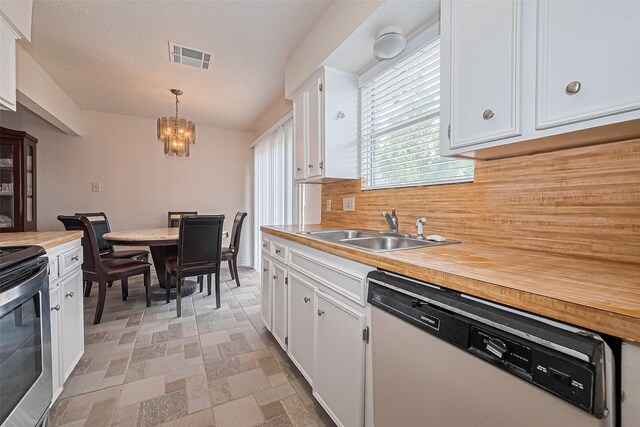 13207 Robinglen Dr, Houston, TX 77083 - kitchen with white dishwasher, a sink, white cabinetry, electric range, and a chandelier