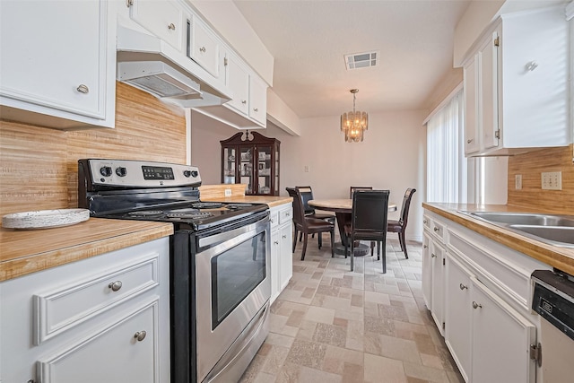 13207 Robinglen Dr, Houston, TX 77083 - kitchen with stainless steel electric range, white cabinetry, a chandelier, and light countertops