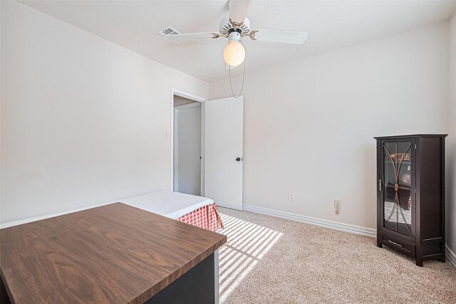 13207 Robinglen Dr, Houston, TX 77083 - unfurnished office with ceiling fan, carpet, and baseboards