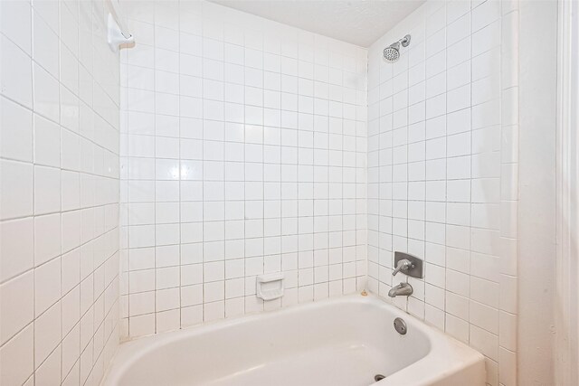 13207 Robinglen Dr, Houston, TX 77083 - full bathroom featuring washtub / shower combination