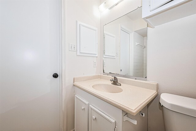 13207 Robinglen Dr, Houston, TX 77083 - bathroom with vanity and toilet