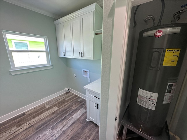 969 Bahama Rd, Crystal Beach, TX 77650 - laundry room with electric water heater, ornamental molding, cabinet space, dark wood-style floors, and baseboards