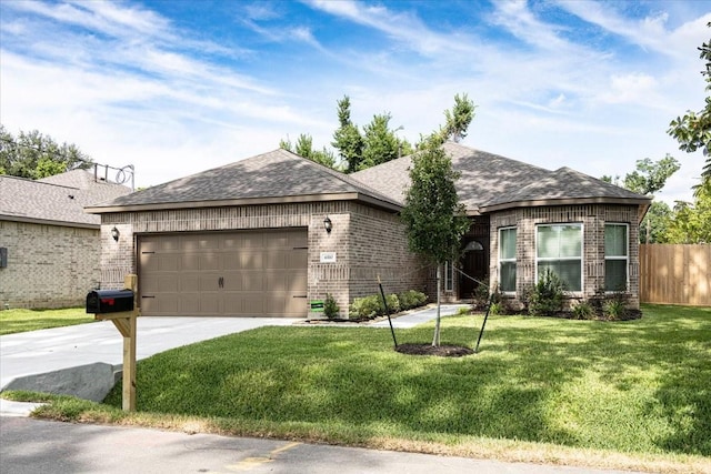 6510 Arabella, Houston, TX 77091 - single story home featuring brick siding, an attached garage, concrete driveway, and a shingled roof